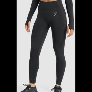 Black gym shark leggings. Never worn. Size medium.